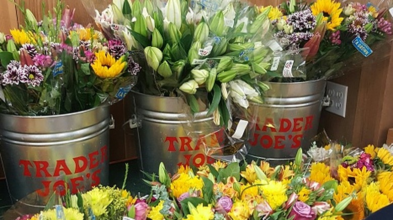 Buckets of Trader Joe's flowers