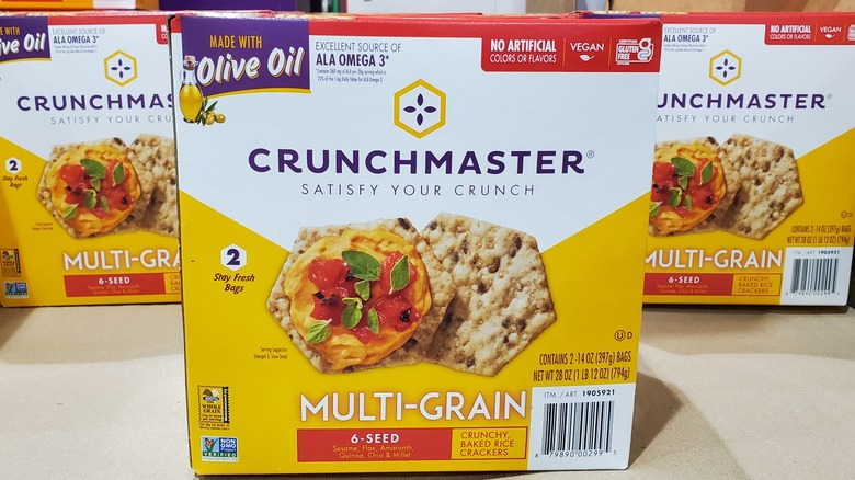 A box of Crunchmaster crackers on a shelf at Costco