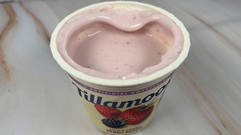 Angled down shot of open container of Tillamook Berry Patch yogurt cup