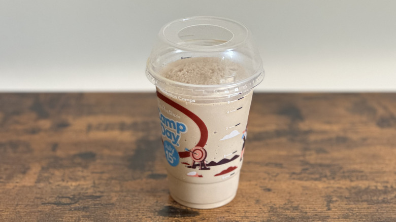 Plastic cup of Tim Hortons Iced Capp on wooden table