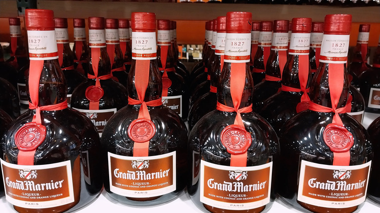 A shelf of Grand Marnier bottles