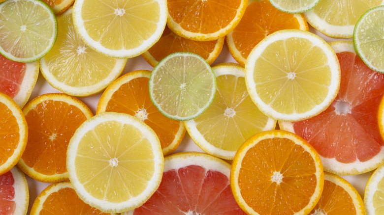 Various citrus slices laid out on top of each other