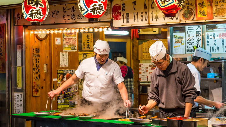 chefs in Japan cooking food