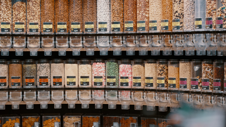 Bulk bins filled with food in a grocery store