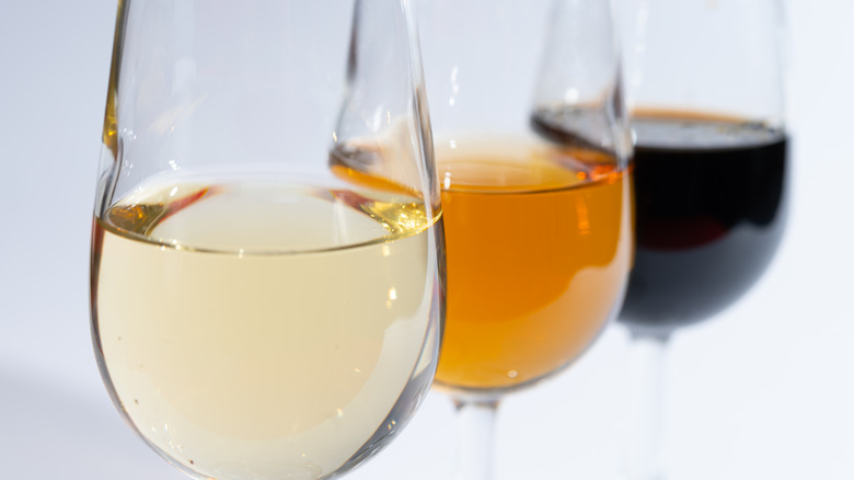 Three types of sherry in wine glasses