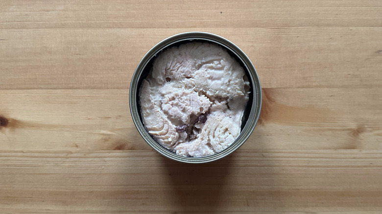 Can of Trader Joe's Wild Alaskan Pink Salmon on wooden table