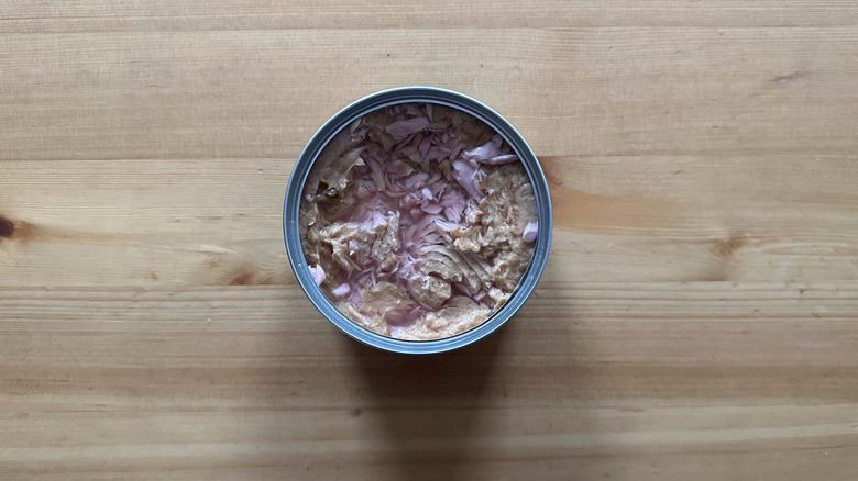 Can of Trader Joe's Chunk Skipjack Tuna in Water on wooden table