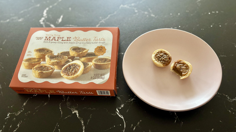 Trader Joe's maple butter tarts box next to tarts on plate