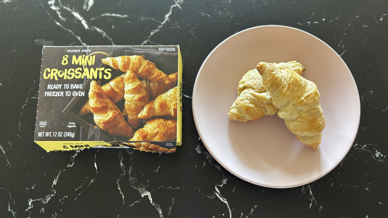 Trader Joe's mini croissants box next to croissants on plate