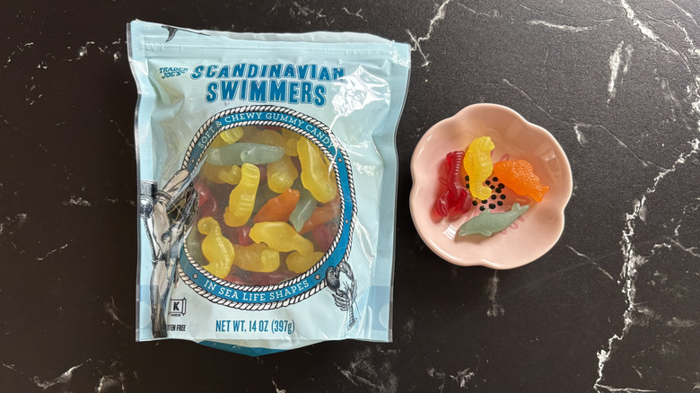 Trader Joe's Scandinavian Swimmers gummy candy bag next to gummy candies in small bowl
