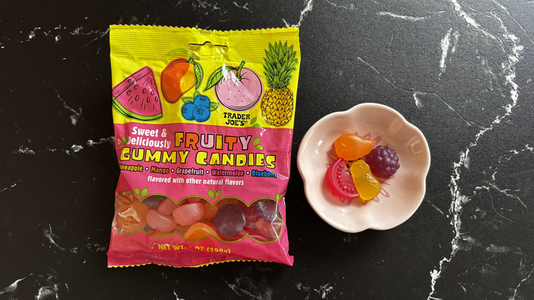 Trader Joe's fruity gummy candies bag next to fruit gummies in small bowl