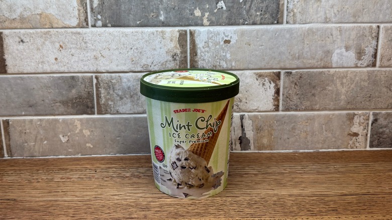 Trader Joe's Mint Chip ice cream on a wooden counter