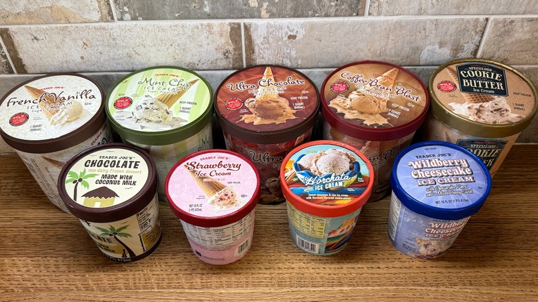 Aerial shot of Trader Joe's ice cream cartons lined on a kitchen counter