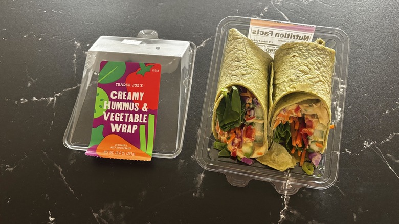 Trader Joe's creamy hummus and vegetable wrap in container