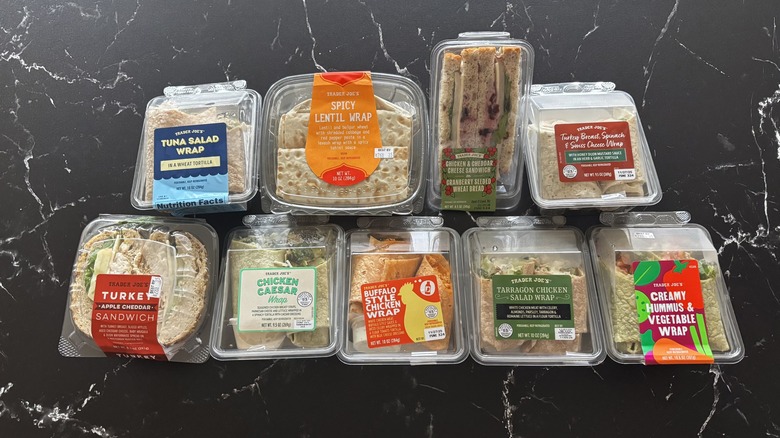 Various Trader Joe's ready-to-eat sandwiches and wraps in containers