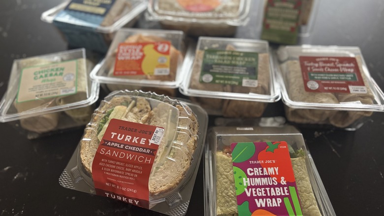Various Trader Joe's ready-to-eat sandwiches and wraps in containers