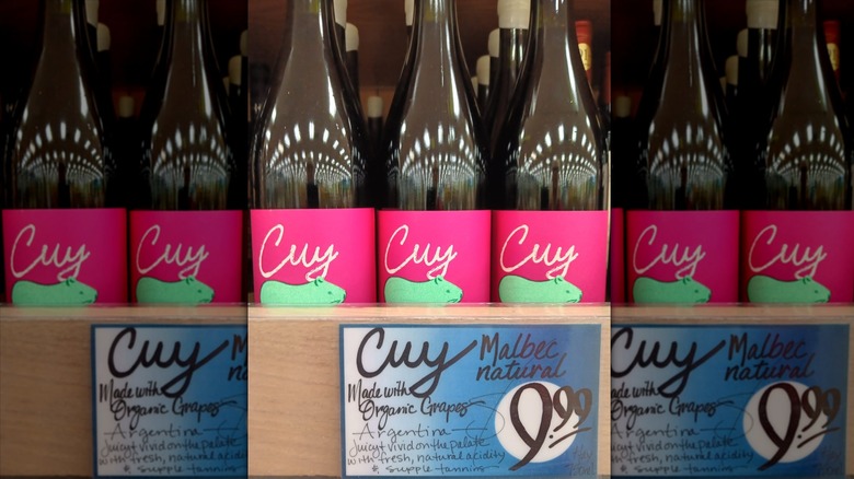 Bottles of Cuy Malbec on store shelf at Trader Joe's