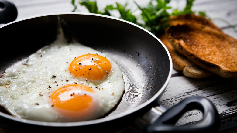 fried eggs in pan