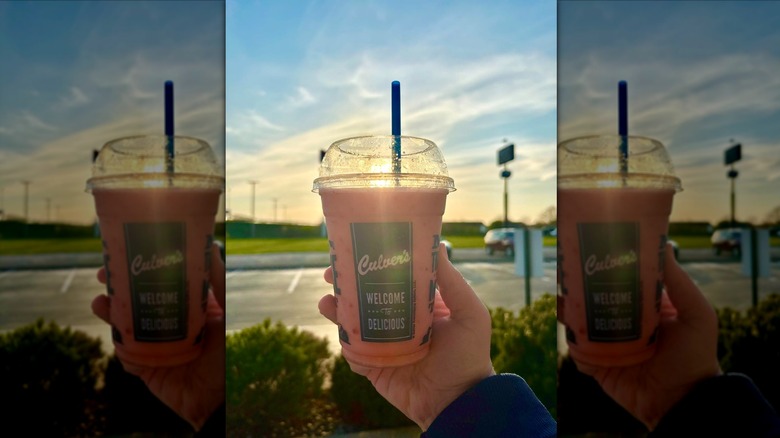 Hand holding Culver's lemon ice smoothie