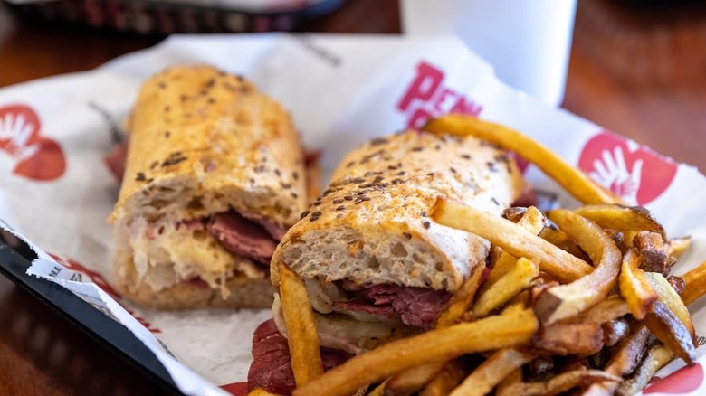 a Penn Station East Coast sub in a basket with fries