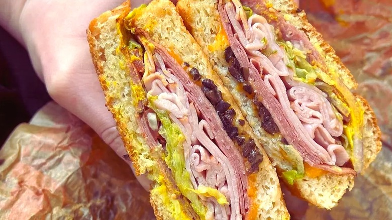 a Schlotzsky's Original sandwich cut in half