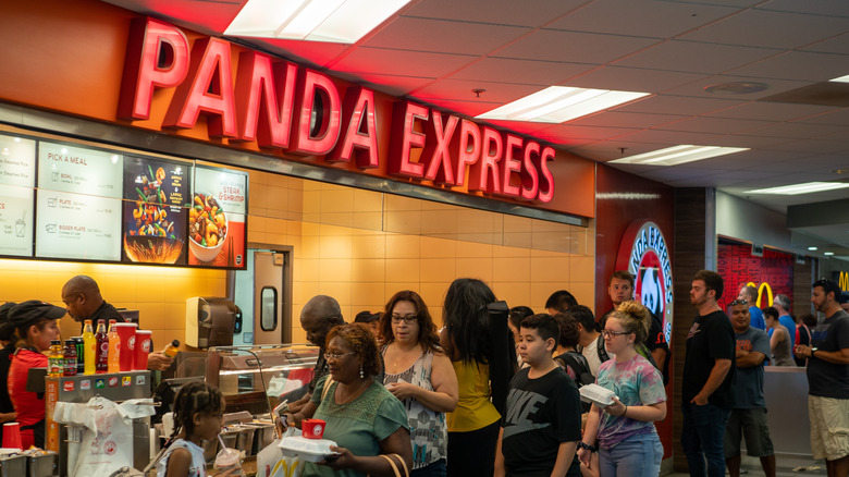 A crowd of people in line at Panda Express