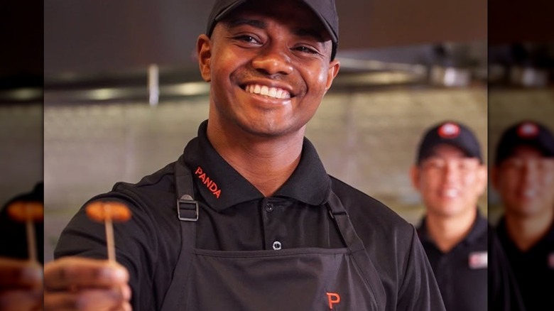 Panda Express employee handing out a free sample