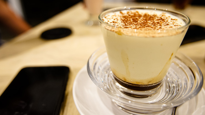 Vietnamese egg coffee in glass cup