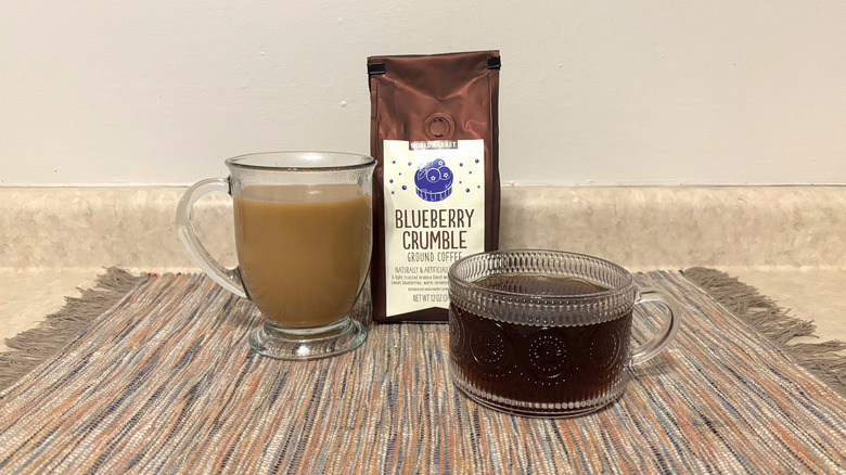 World Market Blueberry Crumble coffee in bag and mugs and marbled placemat