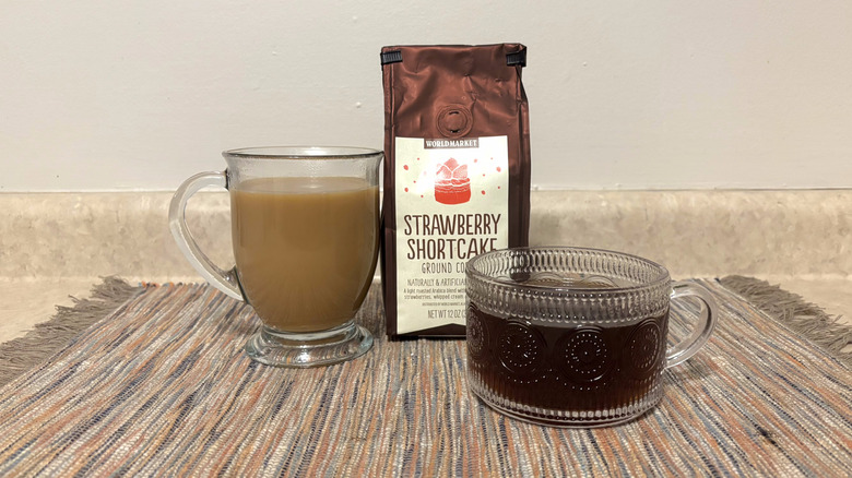 World Market Strawberry Shortcake coffee in bag and mugs and marbled placemat