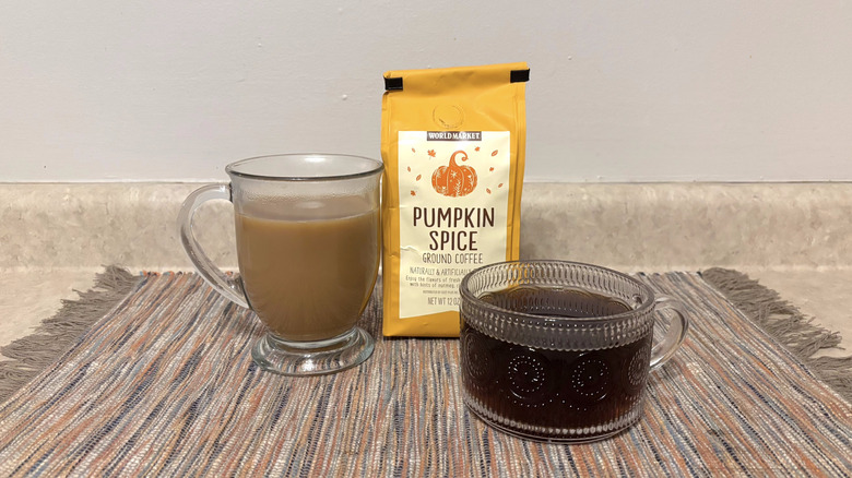 World Market Pumpkin Spice coffee in bag and mugs and marbled placemat