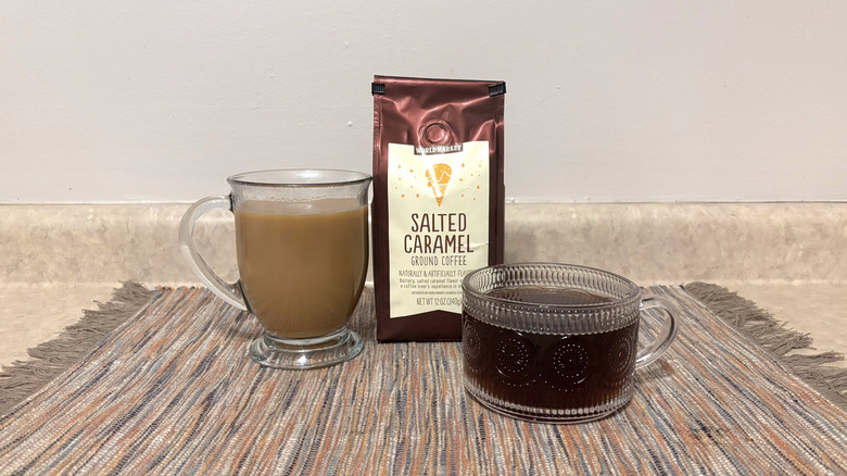 World Market Salted Caramel coffee in bag and mugs and marbled placemat