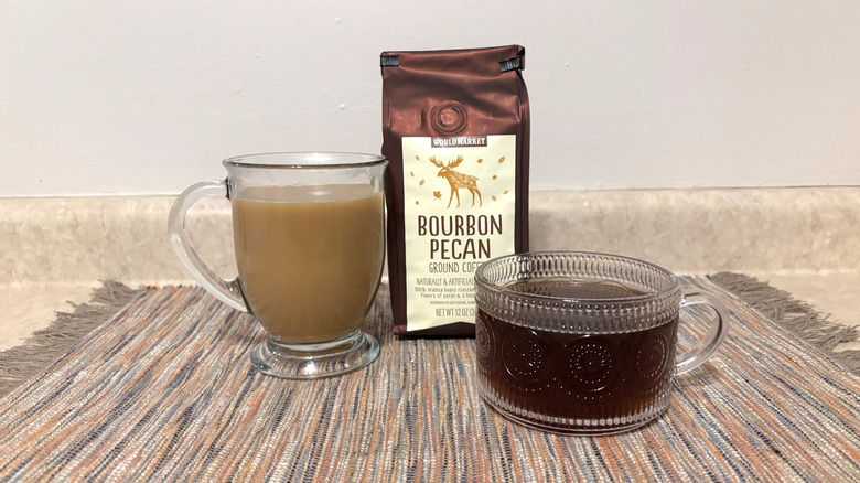 World Market Bourbon Pecan coffee in bag and mugs and marbled placemat