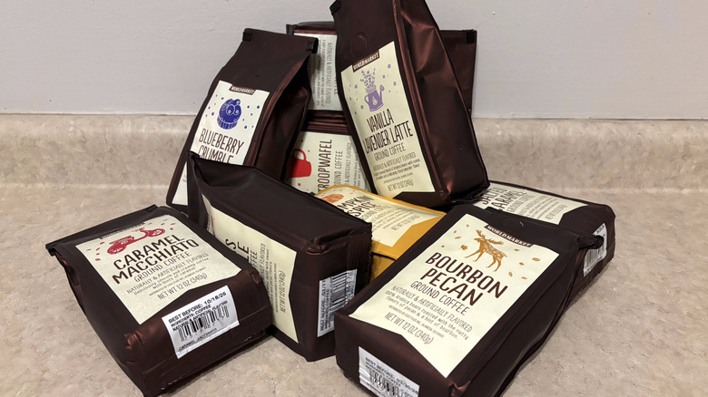 A variety of World Market flavored coffees on neutral countertop