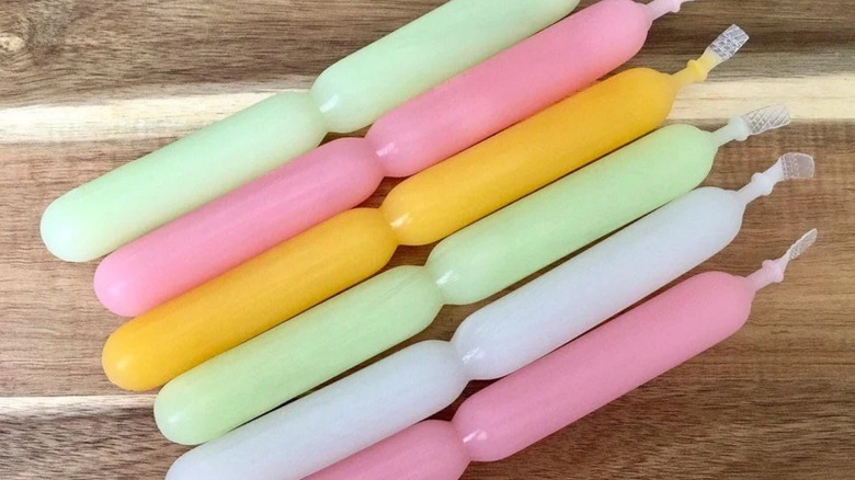 Korean jjoo jjoo bah pops on a wooden surface