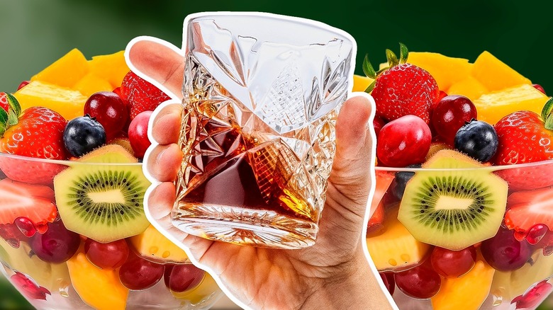 glass of bourbon with fruit