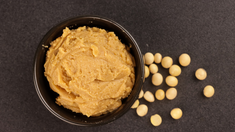 Bowl of light miso paste with soy beans
