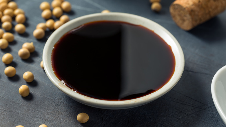 Dish of tarmari surrounded by soybeans