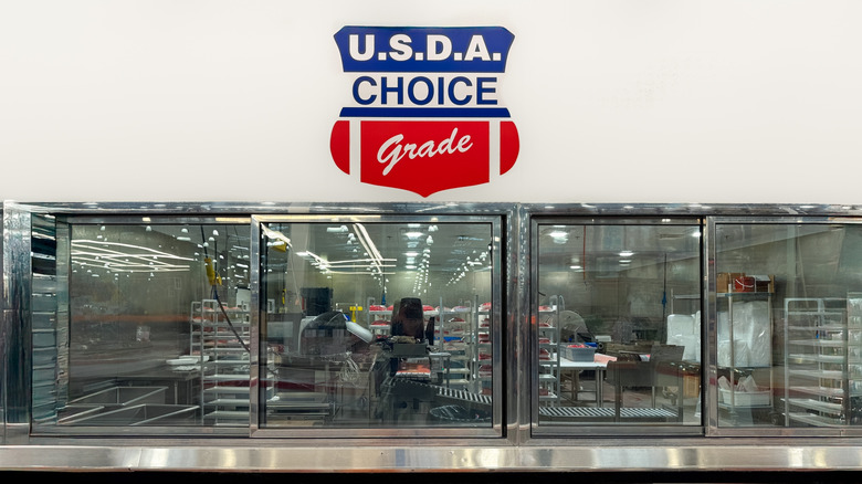 A U.S.D.A Choice grade sign above a butchery