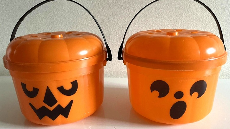Two McDonald's Halloween Pumpkin Happy Meal plastic buckets