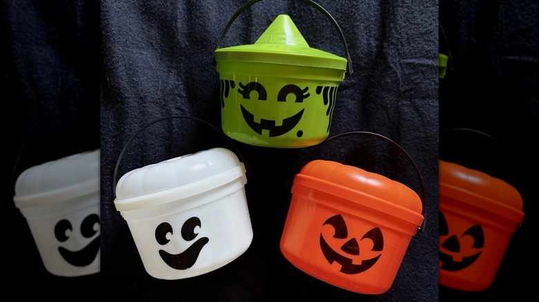 Three McDonald's Boo Buckets in green witch, white ghost, and orange pumpkin designs