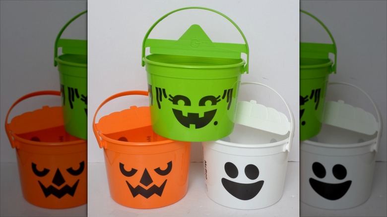 2022 era McDonald's Boo Buckets in green witch, white ghost, and orange pumpkin designs