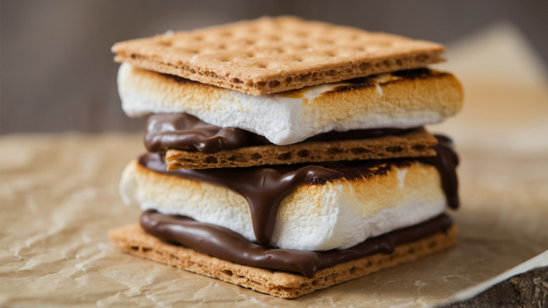 A stack of s'mores filled with marshmallows and chocolate