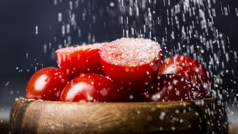 Salt raining on tomatoes