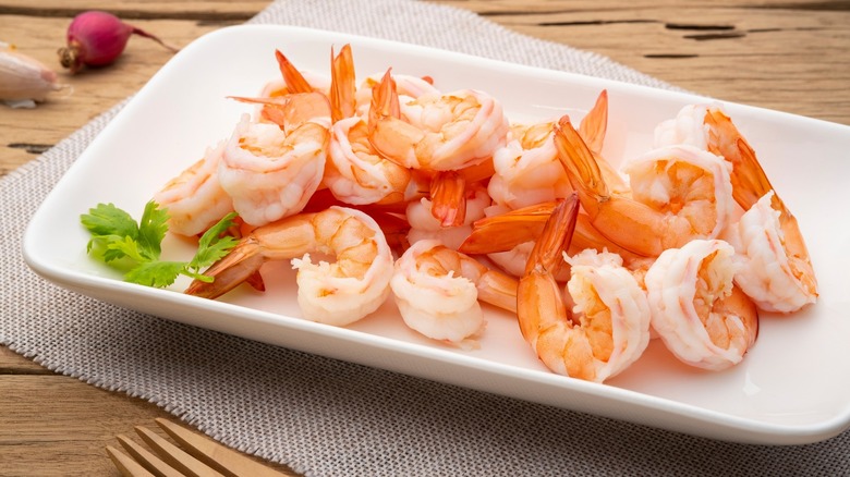 Boiled shrimps in white plate