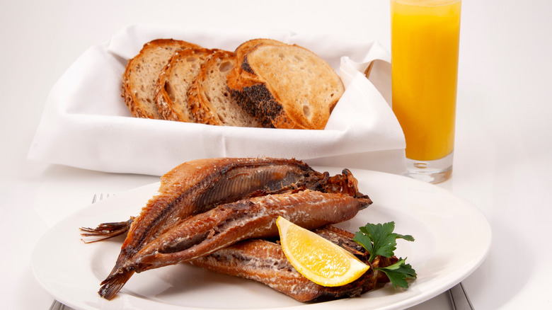 kippers, toast and orange juice breakfast