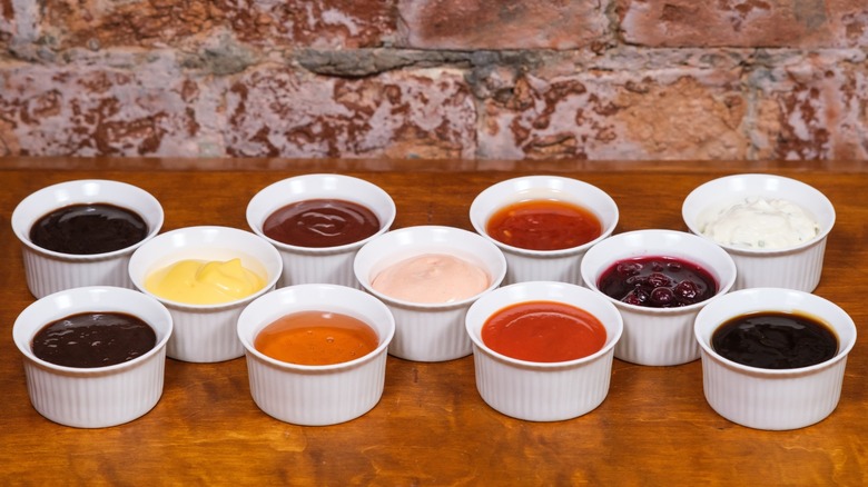 Small bowls full of different sauces