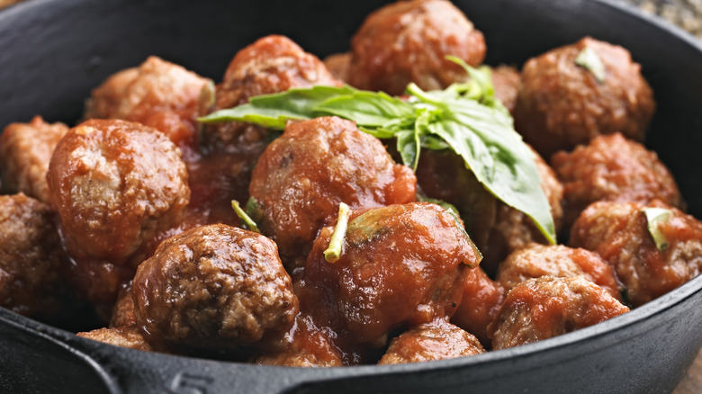 Close up of meatballs in pan 
