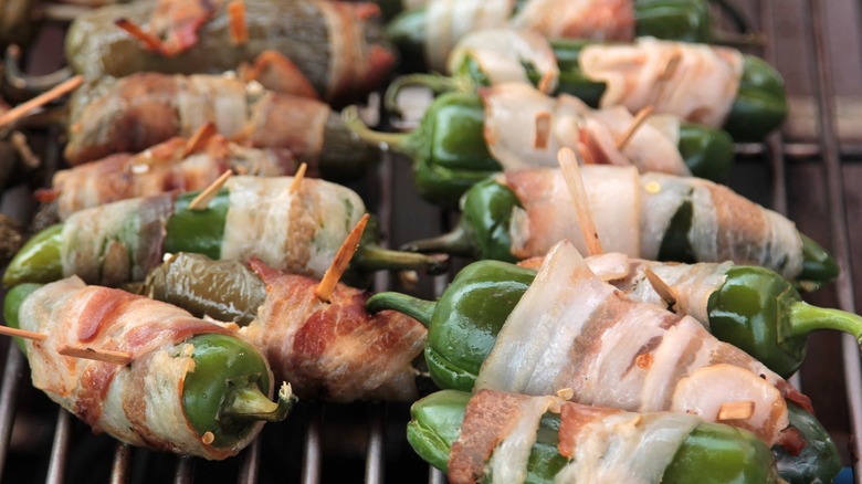 Bacon wrapped jalapeno poppers on the grill