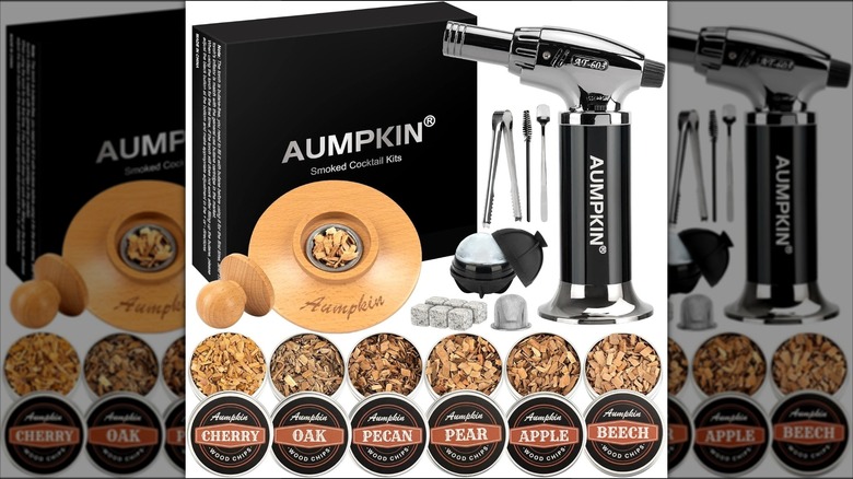 mirrored image of  Aumpkin cocktail smoker kit on white background